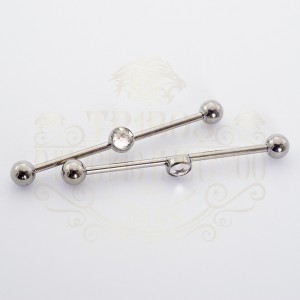 PIERCING TRANSVERSAL PEDRA ZIRCÔNIA MEIO